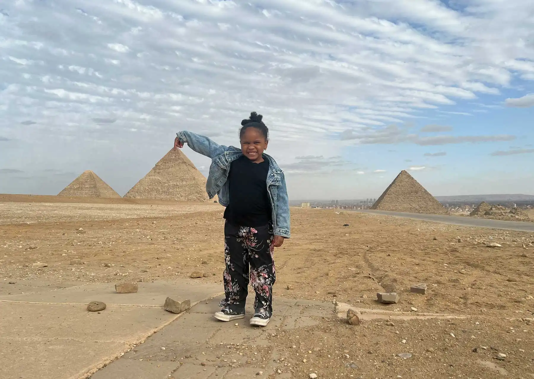 Family enjoying a trip to the Giza Pyramids in Egypt